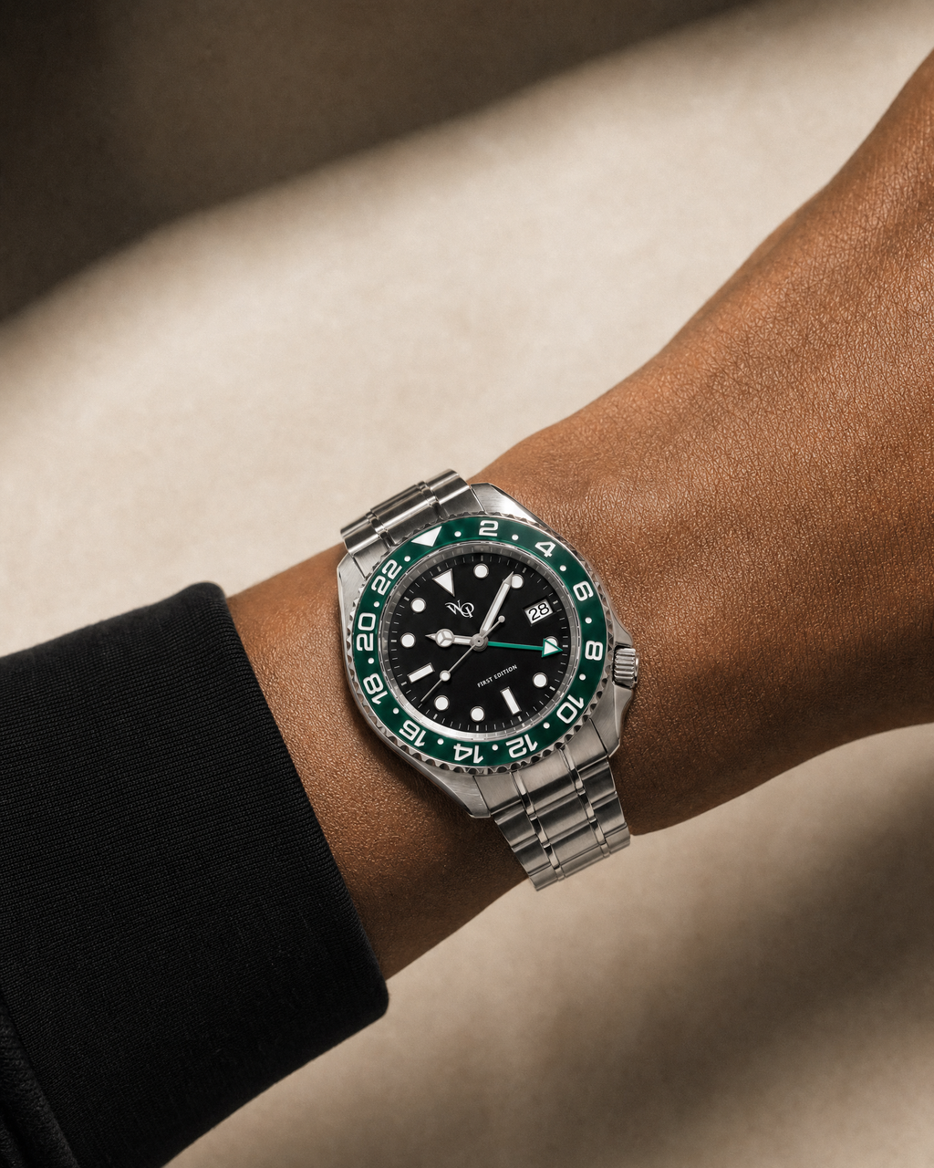 Meridian 04 — Steel / Green watch shown on wrist.