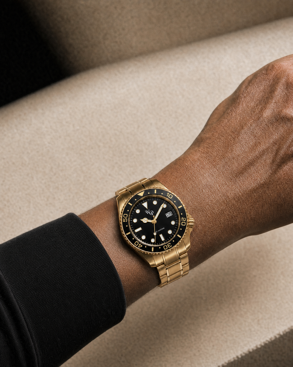 Meridian 05 — Gold / Black watch shown on wrist.
