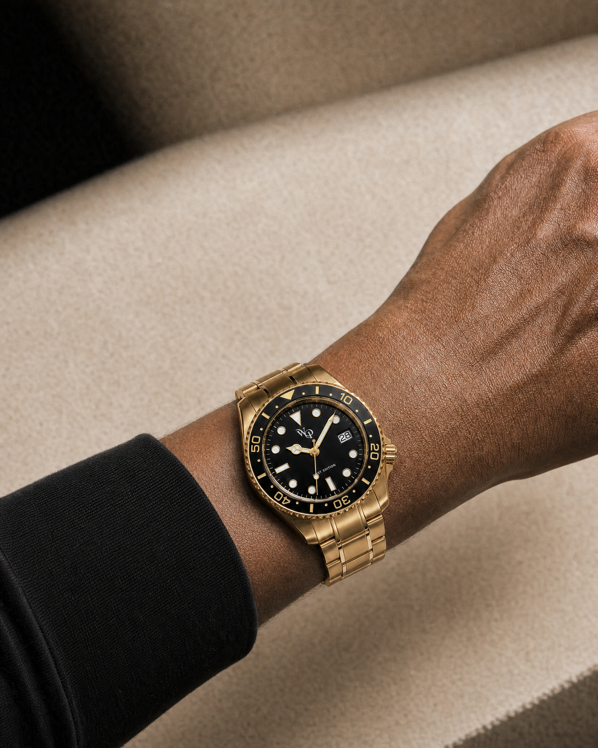 Meridian 05 — Gold / Black watch shown on wrist.