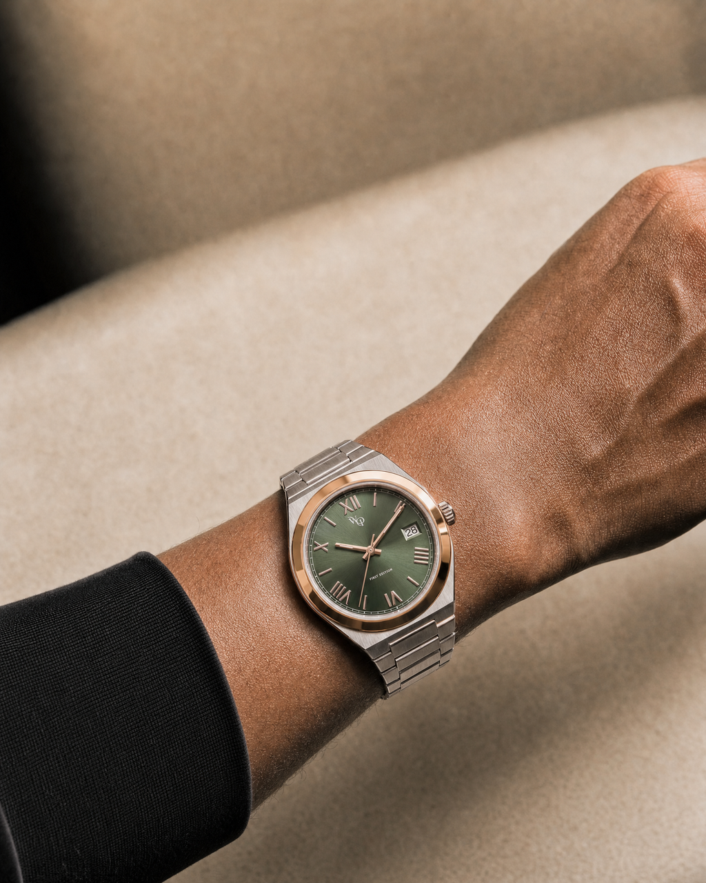 Atria 02 — Rose / Green Radial watch shown on wrist.