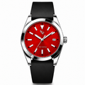 WP-DRAFT-1606 only — red round-date watch with smooth black strap; branded front study. Silver WP and FIRST EDITION; production proof pending.